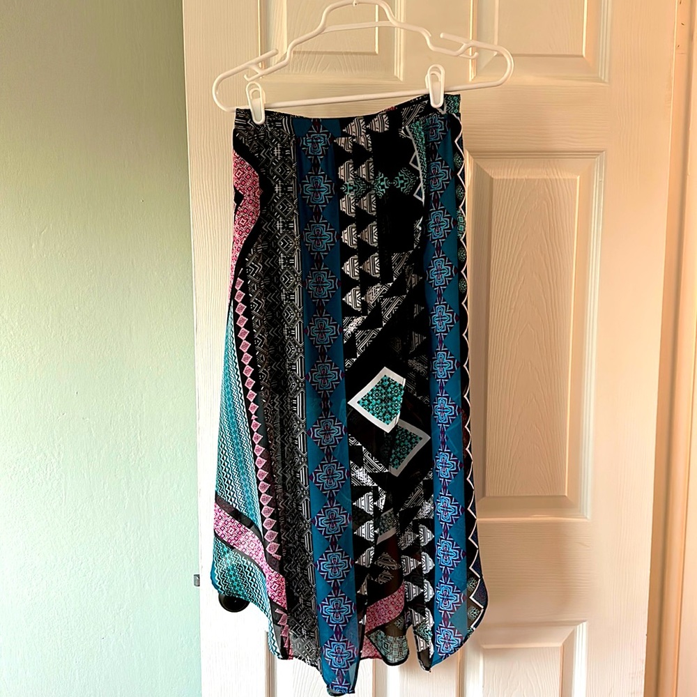 Express XS Asymmetrical Multi colored  skirt. 100% polyester & machine washable.
